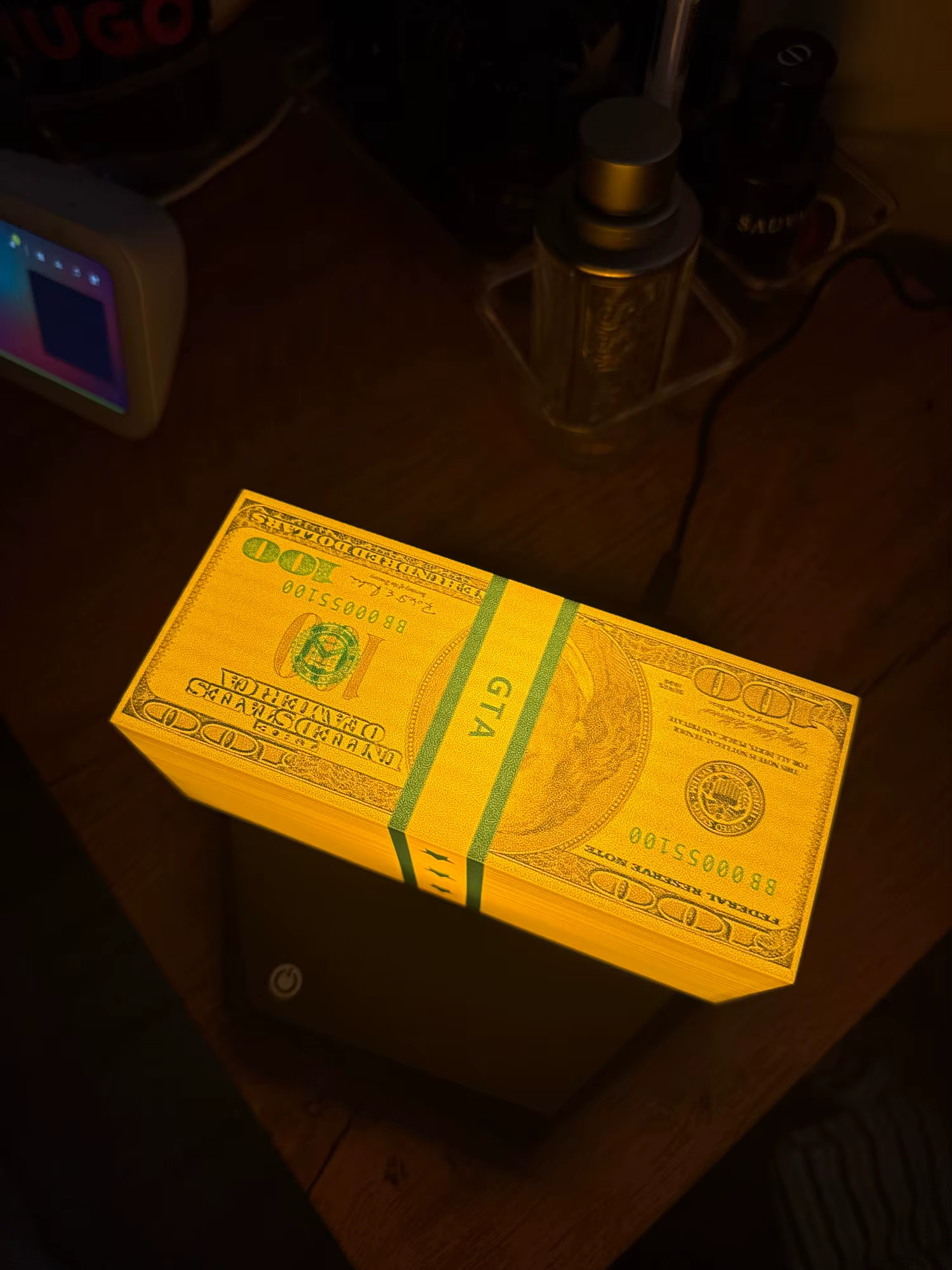 Customer photo 3 of the Wasted Lamp levitating cash lamp on a desk
